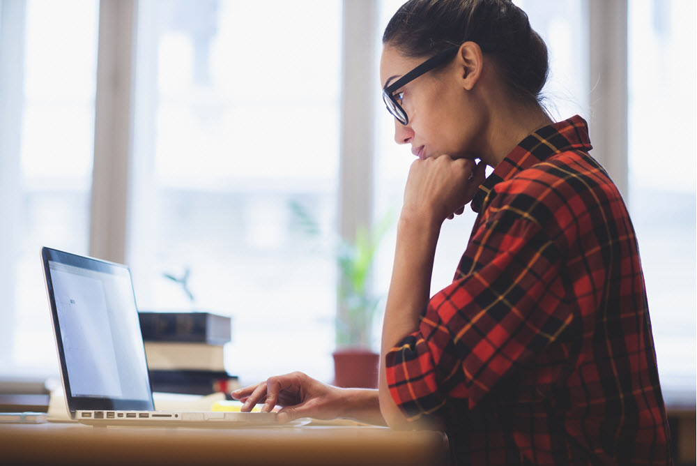 Woman checking her Webnames webmail on laptop