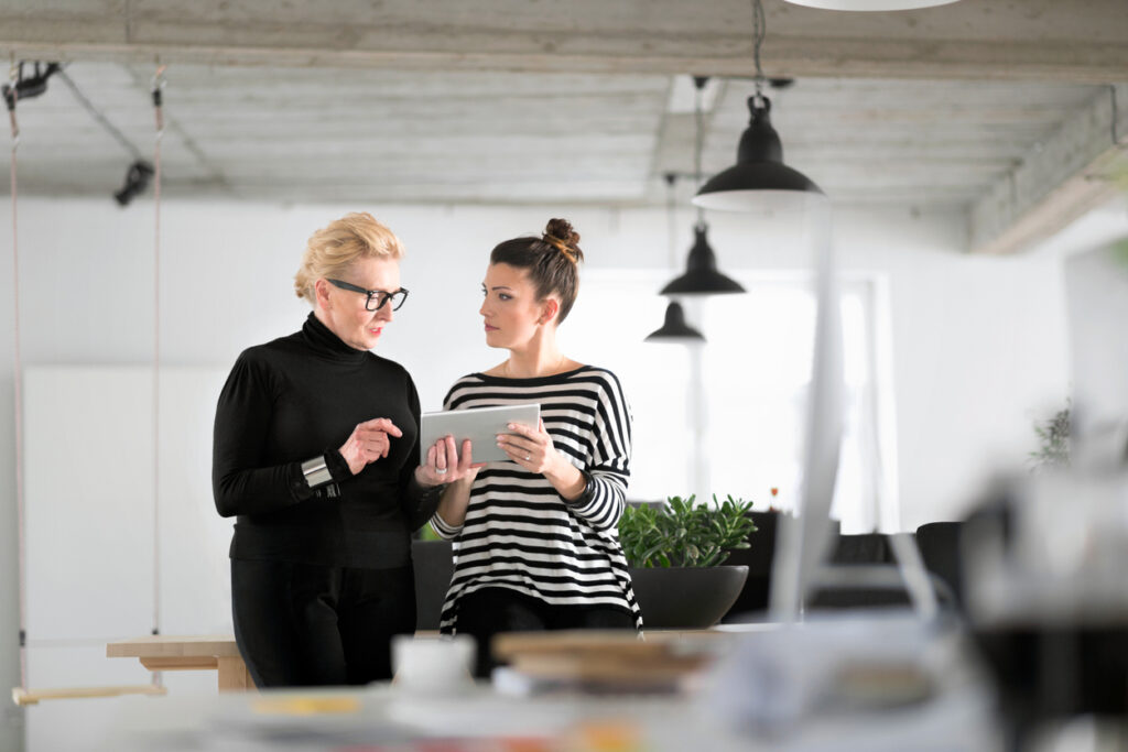 Mature woman mentoring an entrepreneur. 